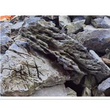 英德石叠石庭院水溪驳岸石与祥云式假山制作技艺